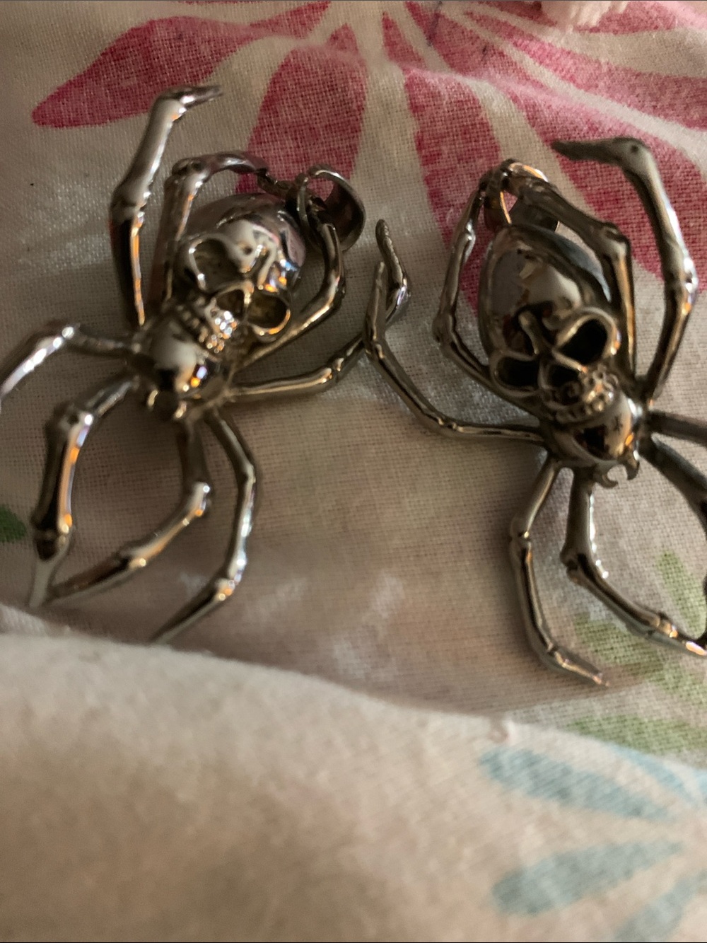 Bundle of 2- Silver Tone Spider Pendants with detailed human skull